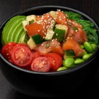 SALMON POKE BOWL · Salmon served with cucumber and green onions mixed
in poke sauce. Enhanced with grape tomato...