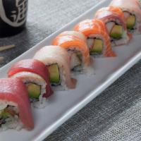 Rainbow Roll · Shrimp, striped bass, yellowtail, tuna and salmon, wrapped around kani and avocado.