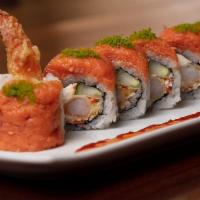 Gojira Roll  · Shrimp tempura, krab† mix, cream cheese and cucumber rolled and topped with spicy tuna and g...