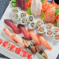Sushi and Sashimi for 2 · 4 tuna, 4 salmon, 2 shrimp, 2 yellowtail, 2 eel, 2 albacore tuna, eel cucumber roll, tuna av...