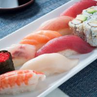 Sushi · 2 tuna, whitefish, salmon, yellowtail, albacore tuna, shrimp, tobiko and choice of a roll. S...