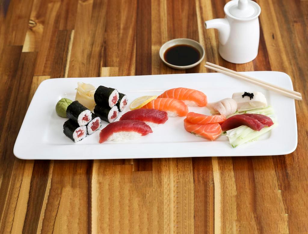 Sushi Sashimi Combo · Five pieces of sushi, ten pieces of sashimi and one California roll. Served with soup or salad. 