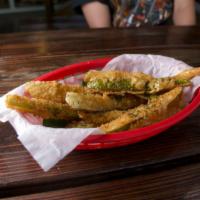 Fried Pickles · Panko breaded, deep-fried to perfection, kosher dill pickle spears, served with vegan poblan...