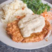 Chicken Fried CHIK-N® · Battered and fried CHIK-N® filet smothered in cream gravy. Served with mashed potatoes and k...