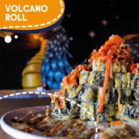 Volcano Roll · Avocado, cream cheese, shrimp and crab. Covered with spicy crab. Topped with eel sauce, spic...