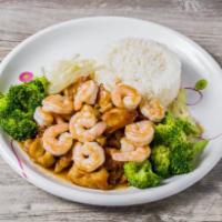 Chicken and Shrimp Teriyaki · Polio y camarones teriyaki. Served with mixed vegetables and steamed rice.