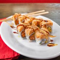 Sunset Special Roll · Salmon, mango inside, and topped with spicy crab.