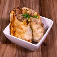 Super Burrito de Fajita · Beef or chicken fajita burrito. Served with rice, beans and a small side salad