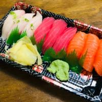 Salmon Tuna Yellowtail Sushi · 3 salmon sushi
3 tuna sushi
3 yellowtail sushi