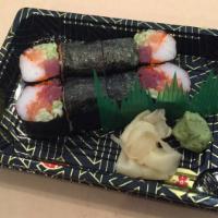 D31. No Rice Roll · Crab, salmon, tuna, cucumber, avocado and masago wrapped with seaweed only