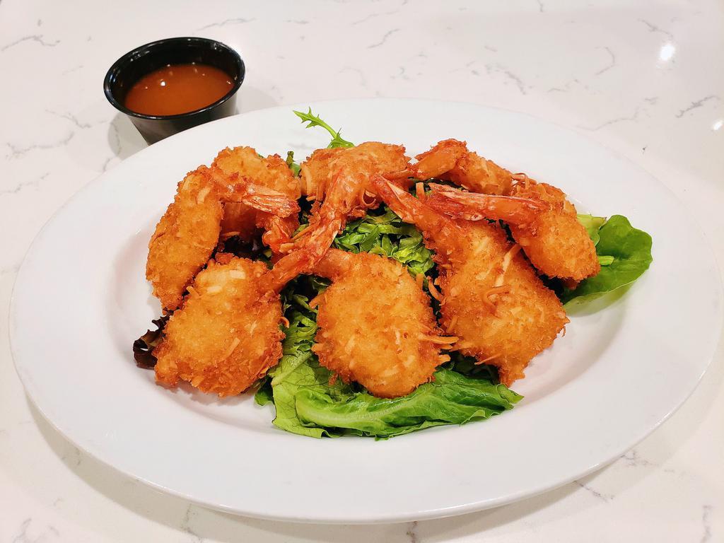 Crispy Coconut Shrimp (8pc) · Crispy coconut battered butterfly shrimp on a bed of spring mix, glazed with sweet chili sauce 