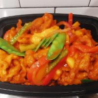 Mango Chicken · Lightly battered chicken and fresh mango tossed with onions, red bell peppers, snow peas, an...