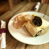 Kennett Square Mushroom Wrap · sautéed mushrooms, baby spinach, arugula, parmesan cheese and a touch of truffle oil in a gr...