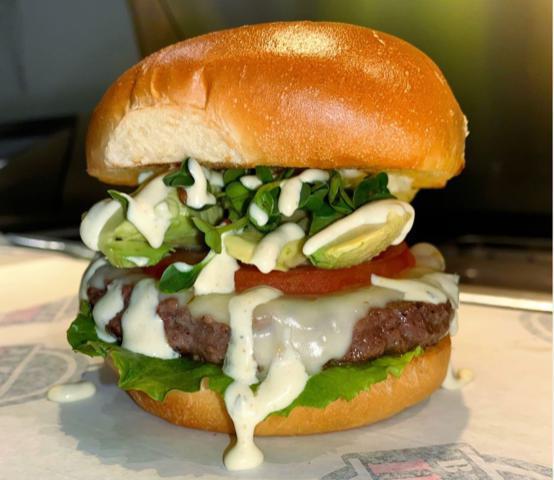 Off the Record · Beef patty, daikon sprouts, avocado, pepper jack cheese, lettuce, tomatoes and jalapeño ranch.