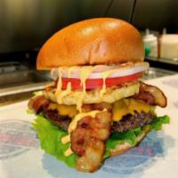 The Boss · Beef patty, grilled fresh pineapple, fried jalapeno, cheddar cheese, hickory smoked bacon, l...