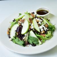 Neighborhood Salad · Baby greens, walnuts, Asian pears, and goat cheese in garlic herb and balsamic vinaigrette.