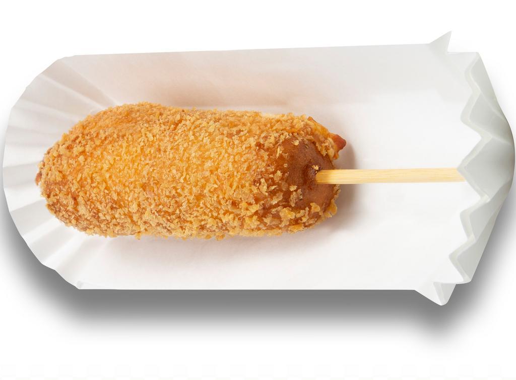Crispy Corn Dog · 100% Beef Sausage.
House made honey batter with cornmeal, buttermilk, panko, & sprinkled sugar.
Served with ketchup & mustard.