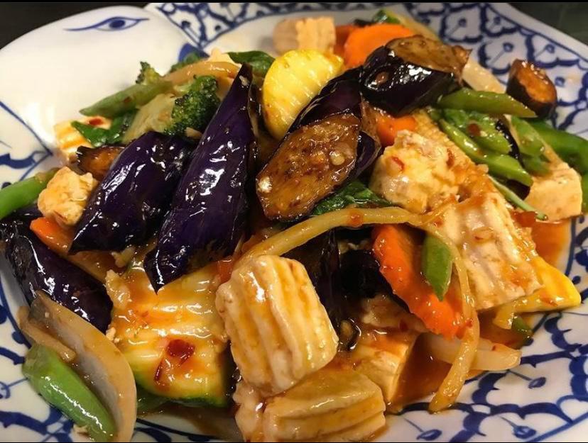 82. Tofu Ma Keur Dinner · Spicy. Eggplant. Fresh sauteed eggplant, tofu, ginger, basil leaves, and mixed vegetables in chili garlic sauce.