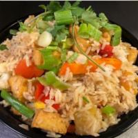 91. Tofu Thai Fried Rice · Thai-style fried rice with fried tofu and mixed vegetables.