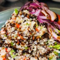 Peruvian Tri-Color Quinoa Salad · Diced cucumber, diced tomatoes, diced red onions, yellow raisins and diced celery with citru...