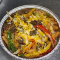 Philly Cheesesteak Fries · Large order of fries topped with chopped grilled philly steak, bell peppers, onions and ched...