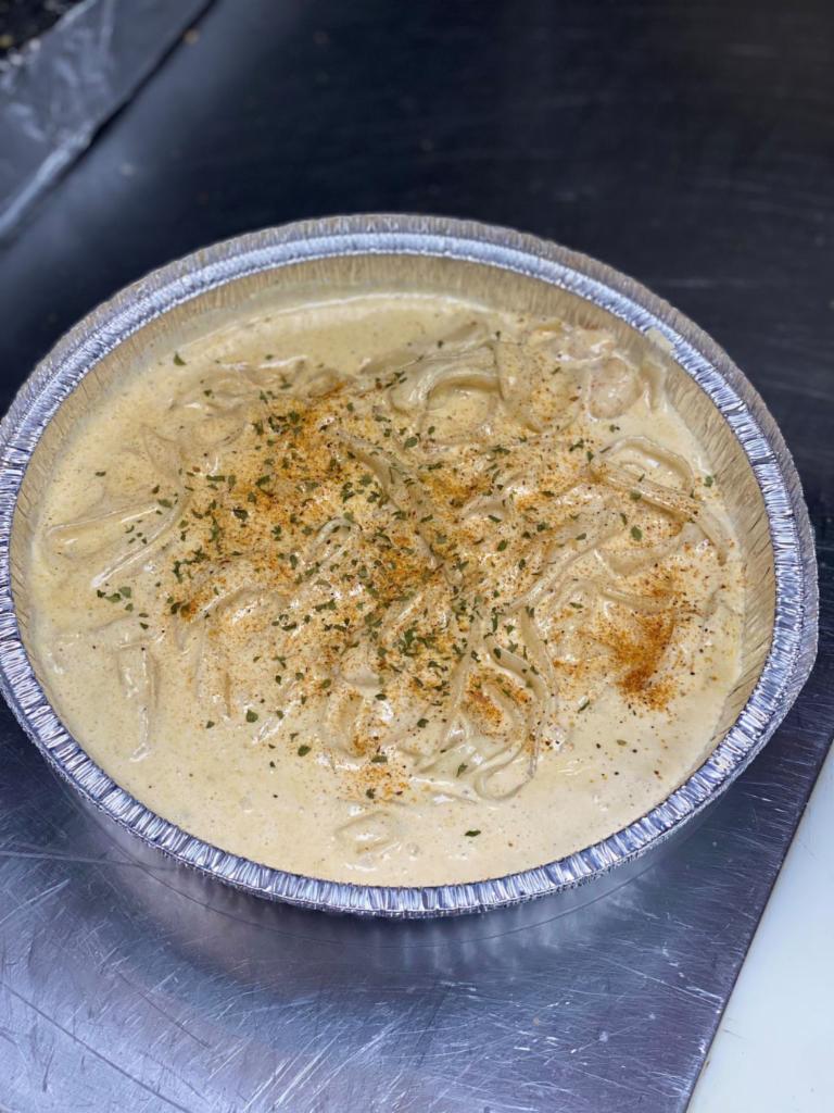 New Orleans Pasta · Romano cheese, cream sauce, Cajun seasoning, Italian spice and fettuccine.