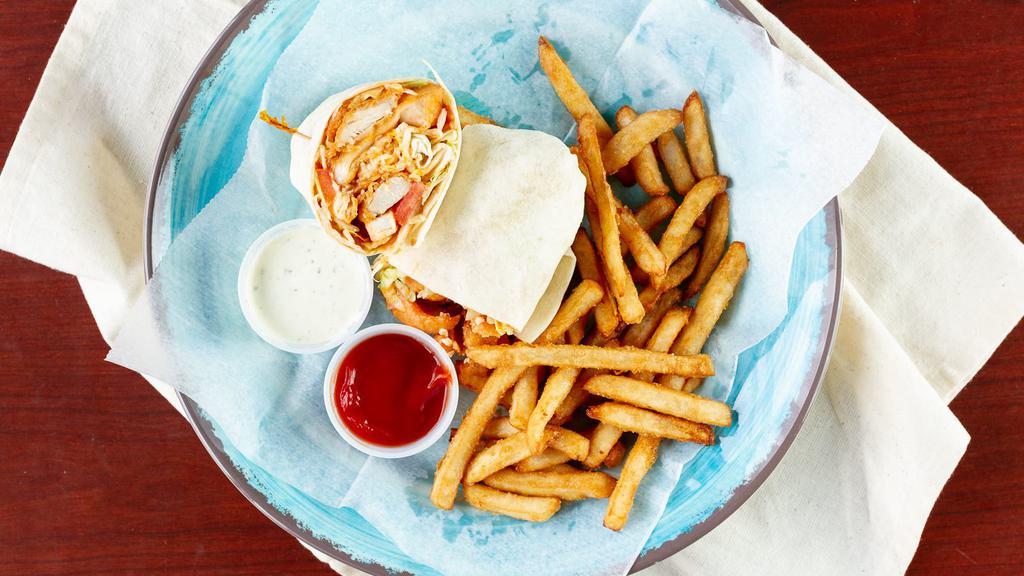Buffalo Chicken Wrap · Breaded chicken breast tossed in a spicy Buffalo sauce with cheddar Jack cheese, lettuce and tomato served with a side of ranch dressing. Includes your choice of french fries or salad and choice of tortilla.