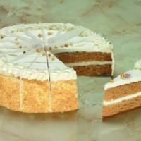 Carrot Cake · Multiple layers of rich, moist carrot cake made with pineapple and walnuts. Topped with smoo...