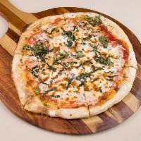 Margherita Pizza · Roma tomatoes, basil, fresh mozzarella, olive oil and fresh tomato sauce.
