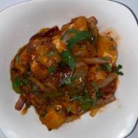 Paneer Chili · Homemade cheese cooked with green peppers, onions and sweet and spicy sauce. Served with bas...