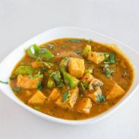 Tofu Jalfrezi · Organic tofu pieces cooked with fresh broccoli, mushroom, peppers, onions and spices. Vegan.