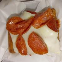 Pizza Puff Supreme · Pork, pizza sauce, mozzarella cheese and spices wrapped in a tortilla and deep fried then to...