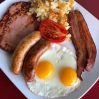 Bubba's Big Breakfast · 2 eggs any style, biscuits and gravy, bacon, ham steak, banger and hash browns.