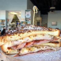 Montecristo Sandwich · A lighter version of the classic montecristo with ham, turkey, cheese and honey grain mustar...