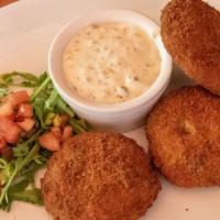 Cod Cakes · Breaded and fried fresh Atlantic Cod, diced peppers and onions, served with our homemade tar...