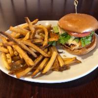 Chicken Sandwich · Delicious fried chicken breast topped with lettuce, tomato and onions and chipotle mayo. Ser...