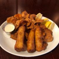 Fish and Chips · Fresh Atlantic Cod is beer battered and fried. Served with homemade fried chips and our tart...