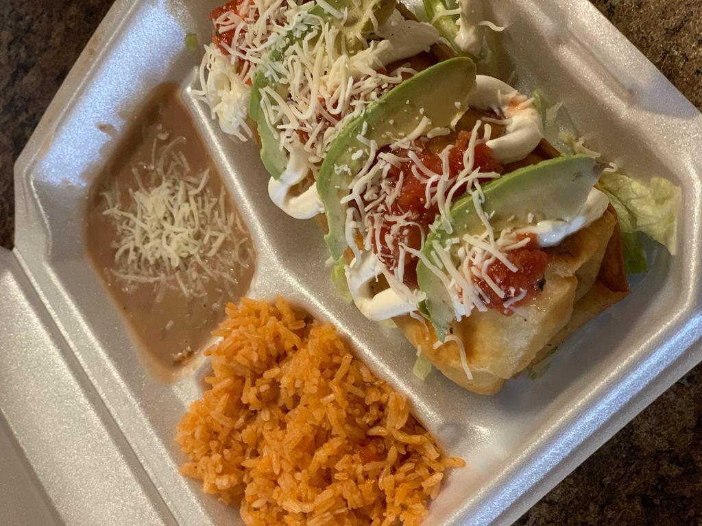 Beef/Chicken/Pork  · A deep fried Burrito stuffed with Choice of Meat and Cheese, Topped with Sour Cream. Served with a side of Rice and Beans. 