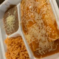 2 Regular Enchiladas · 2 Regular Enchiladas (Choice of Meat) Smothered in our house Salsa and served with Rice & Be...