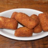 Potato Croquettes · Rolled in breadcrumbs and fried. 