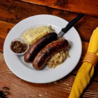 2 House made Sausages/Vegan GF Option · House made sausages served with sauerkraut or braised red cabbage and horseradish mashed pot...