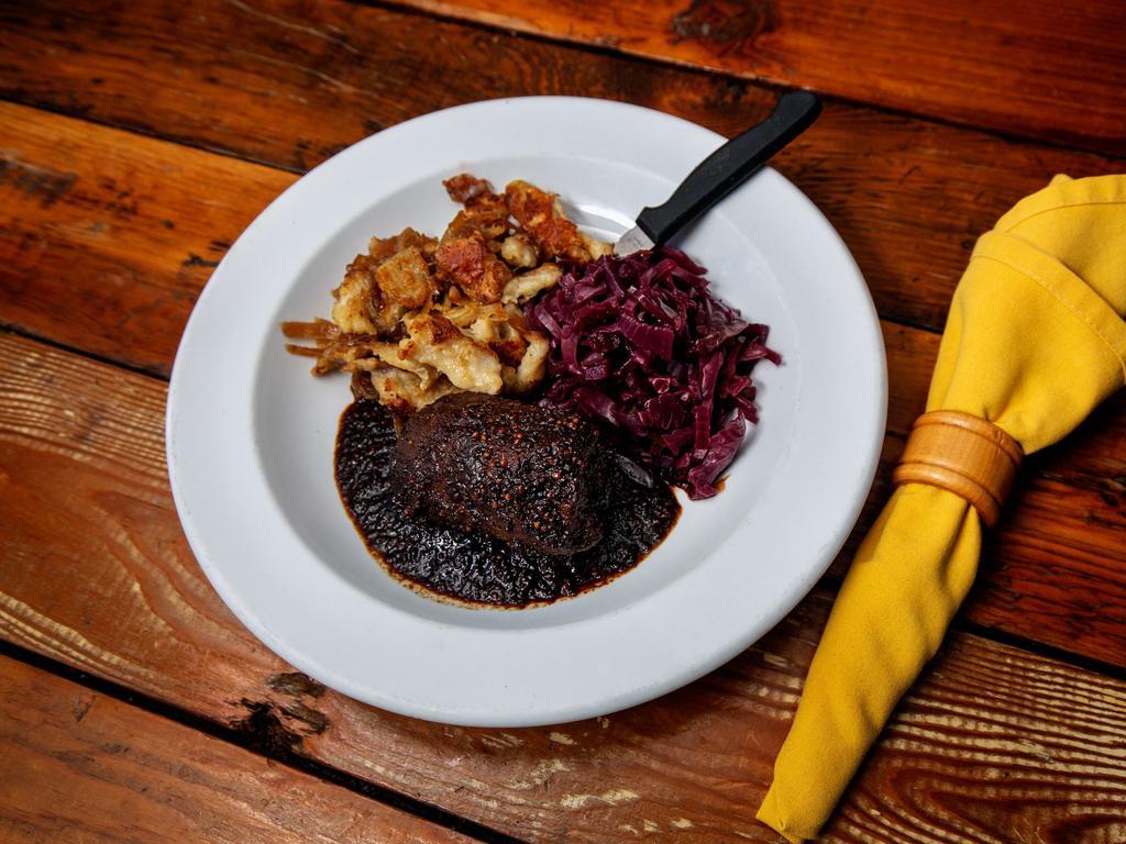 Beef Rouladen/GF Option · Pounded beef top round stuffed with bacon, pickle and carrot, braised in a red wine demi glaze, served with spatzle or gnocchi and Bavarian red cabbage.