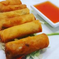 Spring Rolls · Mixed vegetables wrapped in thin spring roll paper then gently deep fried with a house made ...