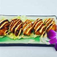 Oysters Tempura · Fresh oysters breaded then fried to perfection, topped with spicy mayo and eel sauce.