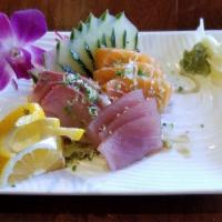 Ozuzukuri Sampler · Thin sliced sashimi cut tuna, salmon and yellowtail with ponzu vinaigrette.