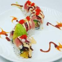 Red Dragon Roll · Shrimp tempura, eel, avocado, 
cucumber inside topped with fresh 
seared tuna, tempura flake...