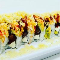 Longhorn Roll · Fresh ahi tuna, salmon, cream 
cheese, avocado topped with 
shrimp, avocado, garnished with ...