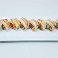 Alaskan Roll · Spicy king salmon, crab meat and 
avocado inside topped with Alaskan 
king crab