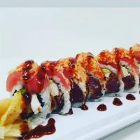 San Antonio Roll · Shrimp tempura, spicy tuna, 
avocado and cream cheese topped 
with fresh salmon and ahi tuna...
