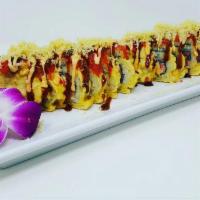 Batosai Roll · Spicy tuna, avocado in tempura 
style topped with spicy tuna